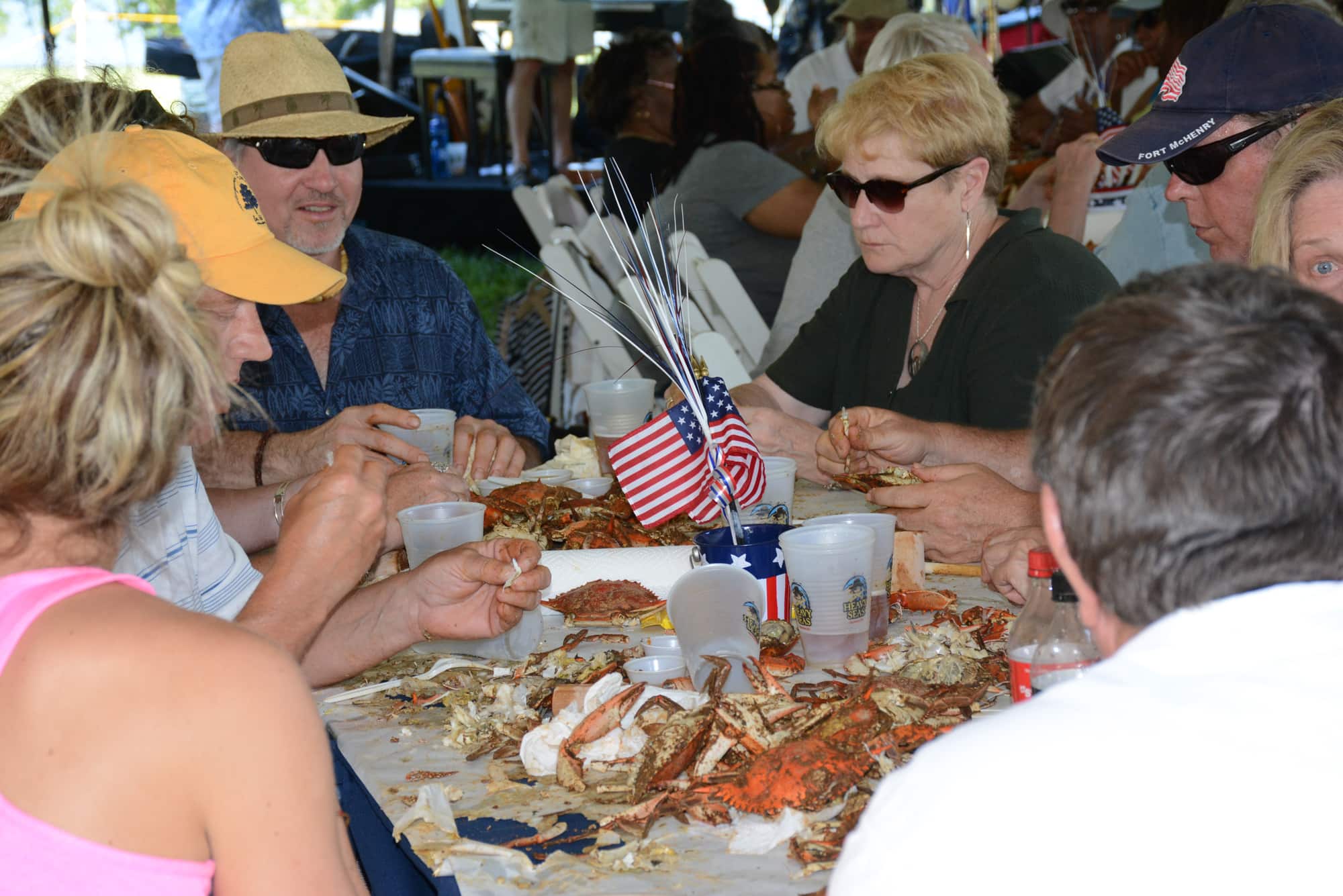 Flags among the festivities - of course - at the Friends of Fort McHenry Crab Feast!
