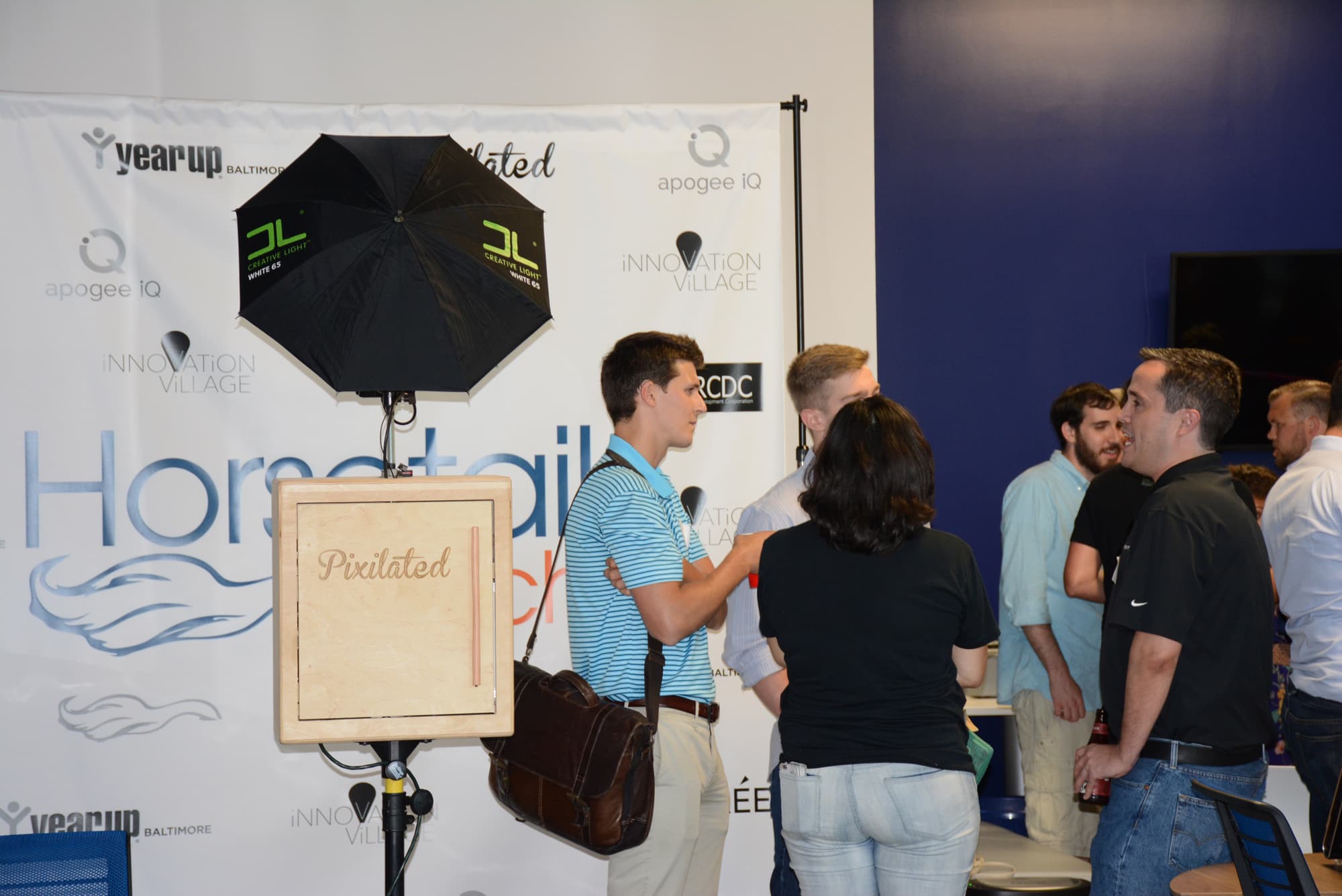Folks gathered at the Harbor Point offices of Horsetail Technologies for the event.