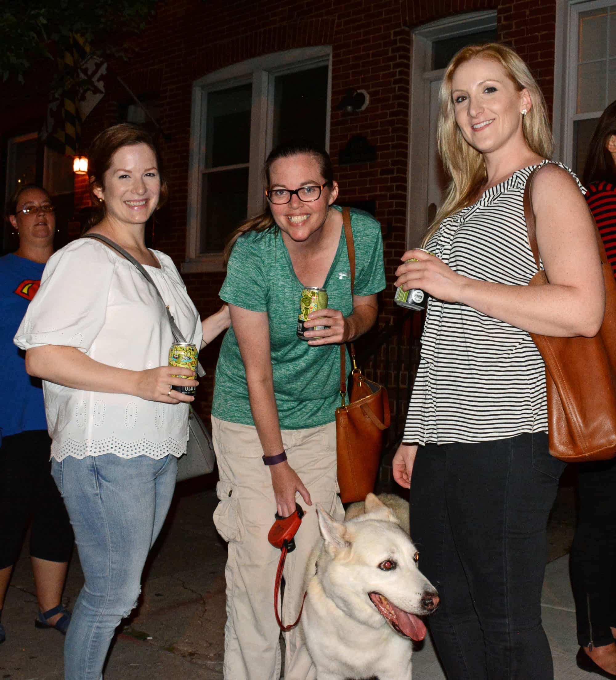 Pictured (LtoR) Ashley Dickinson, The Kellogg Collection manager; Dr. Jamie Bean, Anne Arundel Veterinary Hospital veterinarian; Koa Bean, German Shepherd/Husky mutt; and Liz Godwin, Community College of Baltimore County librarian