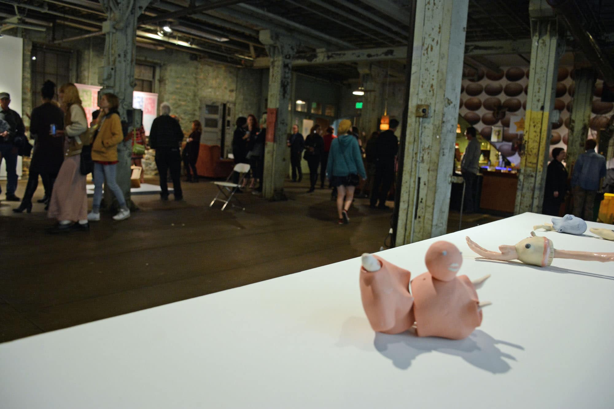 Folks ambled through several areas to check out the work of 37 artists, makers, designers and craftspeople.