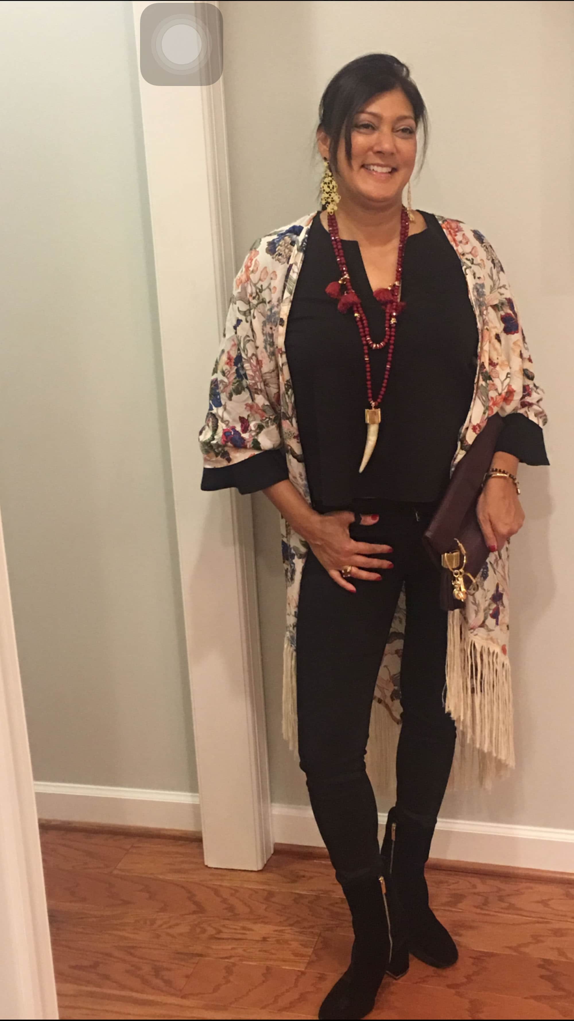 I met Yasmin McCarthy at an event hosted by Roland Park Country School, where our daughters go to school, and was instantly drawn to her conservative yet funky style. Yasmin was wearing a black silk blouse from BCBG and Hudson black skinny jeans from Jean Pool. To spice up the classic black outfit, she added a floral kimono with black cuffs from Caravanserai on the Avenue in Hampden...