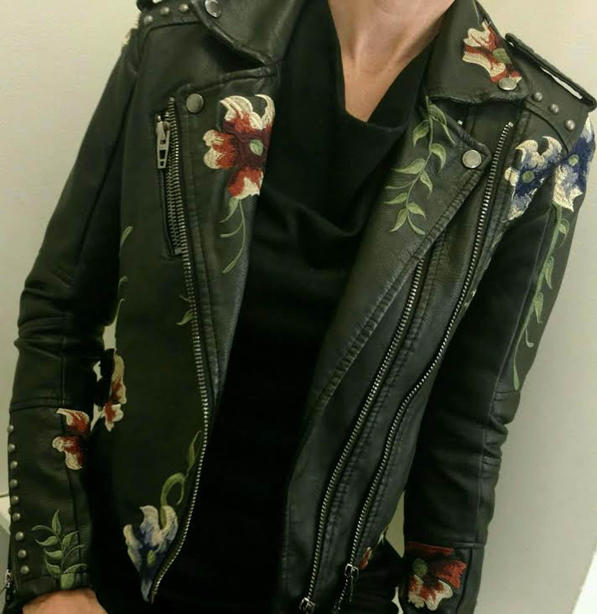 Inspired? The delicate floral embroidery softens up this edgy faux leather motto jacket with silver stud accents. Find it at South Moon Under for $168 by designer BLANKNYC.